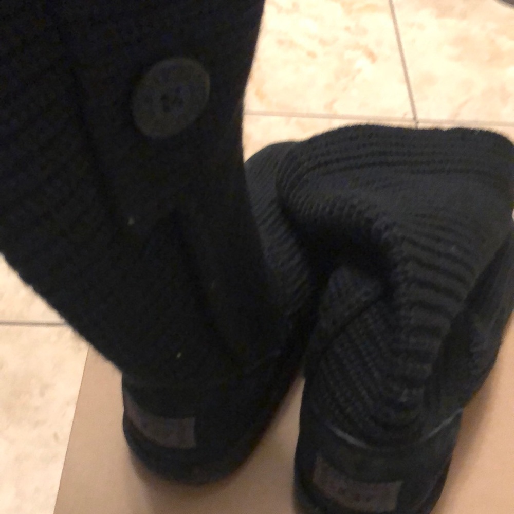 Uggs boots , black no signs of wear off , worn few times excellent condition